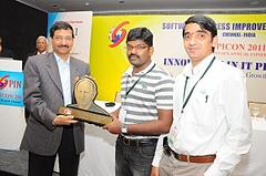 Mr. M. Raghuraman and Mr. R. Srinivasan from Ramco Systems collecting the award from Mr. Arun Jain, Polaris Software
