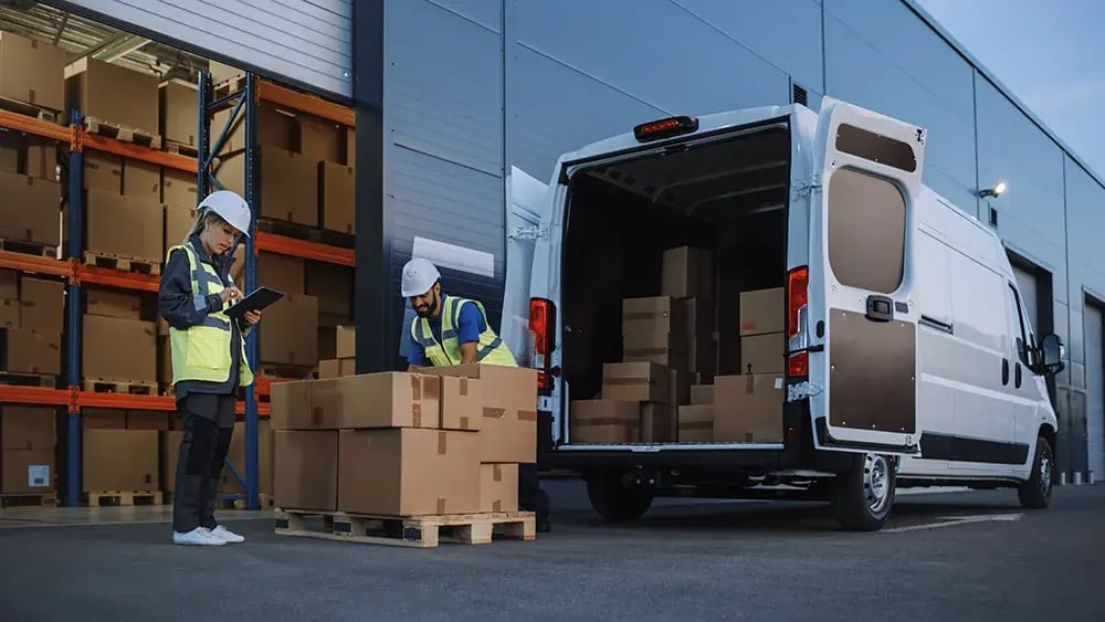  Truck loading operations at a distribution center, coordinated through an advanced logistics system for streamlined efficiency